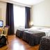 Hotel Ristorante Dragonara room in San Giovanni Teatino with three single beds and desk