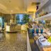 Hotel Panoramic in Caorle: bright hotel dining room with buffet, tables and sea-facing windows
