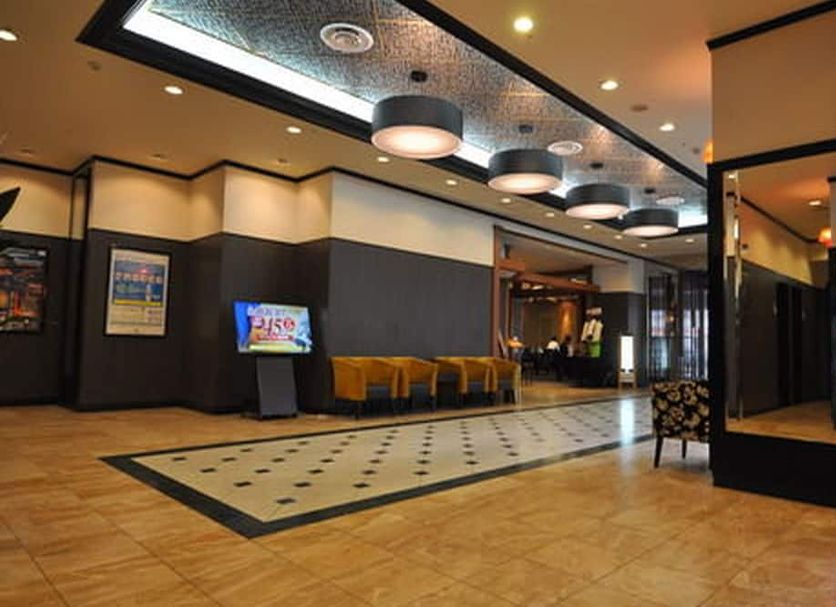 Apa Hotel Obihiro Ekimae lobby with seating and modern lighting in Obihiro