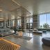 Saadiyat Rotana Resort & Villas lobby lounge in Abu Dhabi with floor-to-ceiling windows and sea views