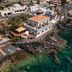 Hotel L'ariana Isole Eolie - Una Esperienze in Leni, cliffside hotel overlooking clear turquoise sea