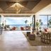 Timbers Kauai Ocean Club & Residences lobby in Lihue with ocean view, open seating, and tropical decor