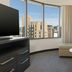 Residence Inn by Marriott Grand Rapids Downtown room with curved city-view window and seating area