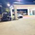 Americas Best Value Inn & Suites Senatobia exterior at night with covered drive-up entrance