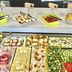 ibis budget Wroclaw Stadion buffet with snack trays, fruit, sandwiches and cold cuts in Wrocław