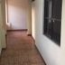 Acuarela Huasteca in Ciudad Valles hallway with tiled floor and windows