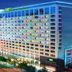 Holiday Inn Shanghai Pudong Nanpu by IHG in Shanghai, illuminated high-rise hotel exterior at night