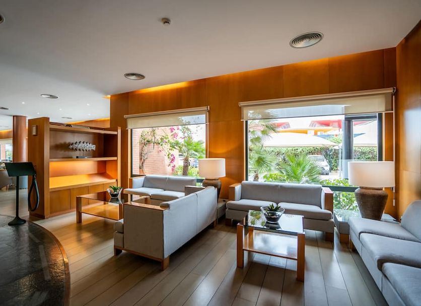 Posadas De España Cartagena lobby with seating area and large windows in Cartagena