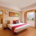 Lemon Tree Hotel, Gachibowli, Hyderabad guest room with king bed and city view