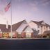 Residence Inn by Marriott Albany East Greenbush/Tech Valley exterior with American flag in East Greenbush