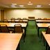 Meeting room at Holiday Inn Express & Suites Brooksville West By IHG in Brooksville with tables and chairs