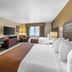 Best Western PLUS Truckee-Tahoe Hotel room with two beds, desk, TV and window seating in Truckee