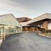 Skylight Inn Cleveland - Willoughby entrance with curved driveway and covered canopy in Willoughby