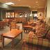 Isle Of Mull Hotel and Spa lounge on the Isle of Mull with wooden seating and bar area