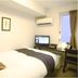 Value the Hotel Ishinomaki room with bed, desk, TV, and air conditioner