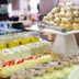 Alegria Plaza Paris in Lloret de Mar buffet with pastries, fruit-topped cake, and dessert cups