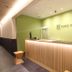 Koko Hotel Osaka Namba Ebisucho lobby reception desk in Osaka with green accent wall