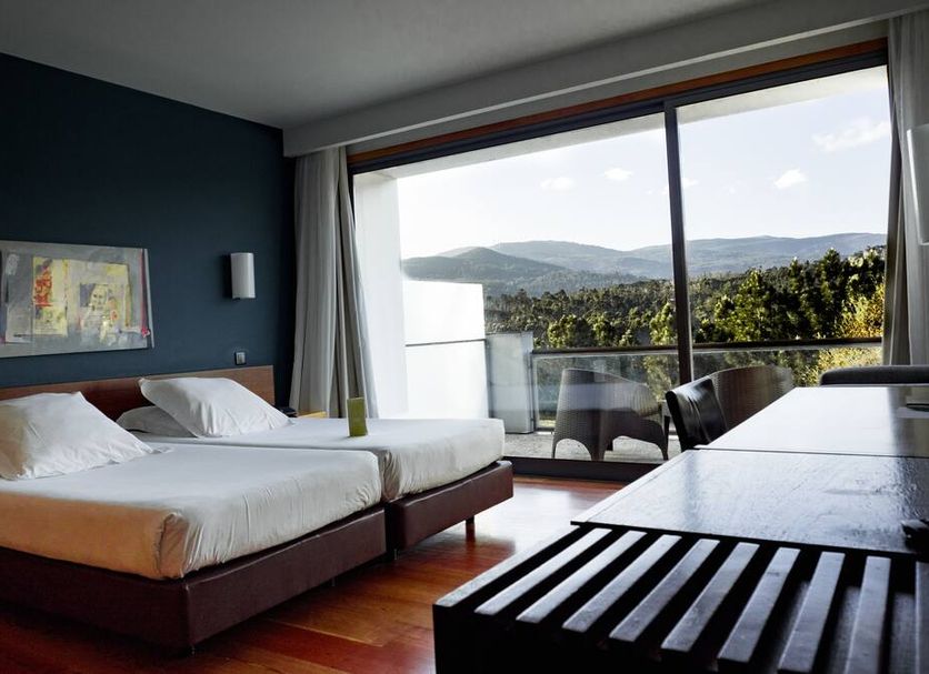 Monte Prado Hotel & Spa in Melgaço room with twin beds and balcony mountain view