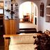 Hosteria La Raclette in San Martín de los Andes, cozy lounge with archway and seating