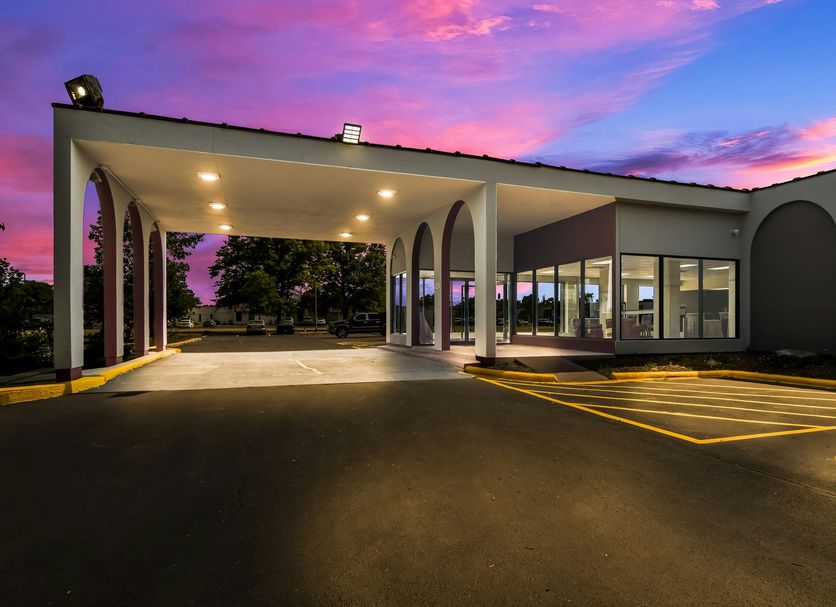 Red Roof Inn & Conference Center Chicago - Aurora Fox Valley entrance at dusk in Aurora