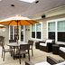 Residence Inn by Marriott New Bedford Dartmouth patio with tables, umbrellas, grill and seating