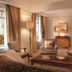 The Ritz-Carlton New York Central Park suite with seating area and Central Park view in New York