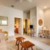 Casa 325 Key West room with tiled floor, seating area, small table and open doorway