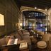 Sant Francesc Hotel Singular in Palma de Mallorca lobby with lounge seating, arched windows and warm lighting