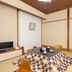 Omiya Ryokan in Hakone tatami room with low table and floor chairs