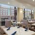 Wyndham Anaheim Hotel in Anaheim dining area with booth seating and large windows