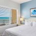 Royal Floridian Resort by Spinnaker bedroom with ocean view balcony in Ormond Beach