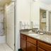 Residence Inn by Marriott Oklahoma City South bathroom with granite vanity and shower-tub combo in Oklahoma City