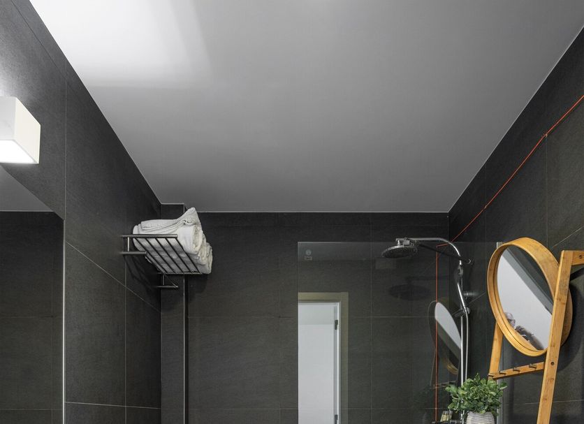 Quinta d'Anta- Hotel Rural bathroom in Reveles with walk-in shower, sink and wooden ladder shelf