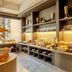 Buenos Aires Ezeiza Airport Marriott breakfast buffet with pastries, fruit and dining shelves in Buenos Aires