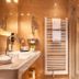 Hotel Sonne Rheda Wiedenbrueck bathroom with walk-in shower, double sink and heated towel rail