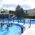 Akay Garden Family Club in Ildir: family pool with waterfall and children playing in the water
