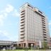 Hotel Route-Inn Kanazawa Ekimae high-rise exterior in Kanazawa with balconies and blue sky