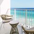 Hyatt Place Panama City Beach/Beachfront balcony with wicker chairs and ocean view