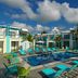 Margaritaville Island Reserve Riviera Cancun pool with turquoise loungers in Puerto Morelos