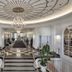 The Historic Cavalier Hotel and Beach Club, Autograph Collection lobby with chandelier and checkered floor in Virginia Beach