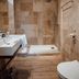 Le Manoir des Impressionnistes - Bord de Mer bathroom in Honfleur with walk-in shower and wood-look tile floor