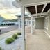 Sea Girt Lodge in Sea Girt exterior walkway with green room doors and covered porch