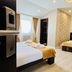 Side One Design Hotel Garni in Belgrade guest room with twin beds and modern decor