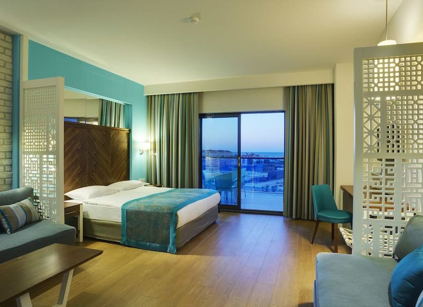 Terrace Elite Resort in Side guest room with balcony sea view and modern seating area