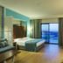 Terrace Elite Resort in Side guest room with balcony sea view and modern seating area