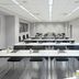 Sercotel Boulevard Vitoria meeting room in Vitoria-Gasteiz with rows of tables and black chairs