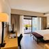 Libertad Hotel Buenos Aires room with king bed, desk, and balcony doors in Buenos Aires