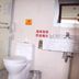 Ssaw Boutique Shanghai South Xuhui Riyue bathroom with toilet, glass shower, sink and mirror in Shanghai
