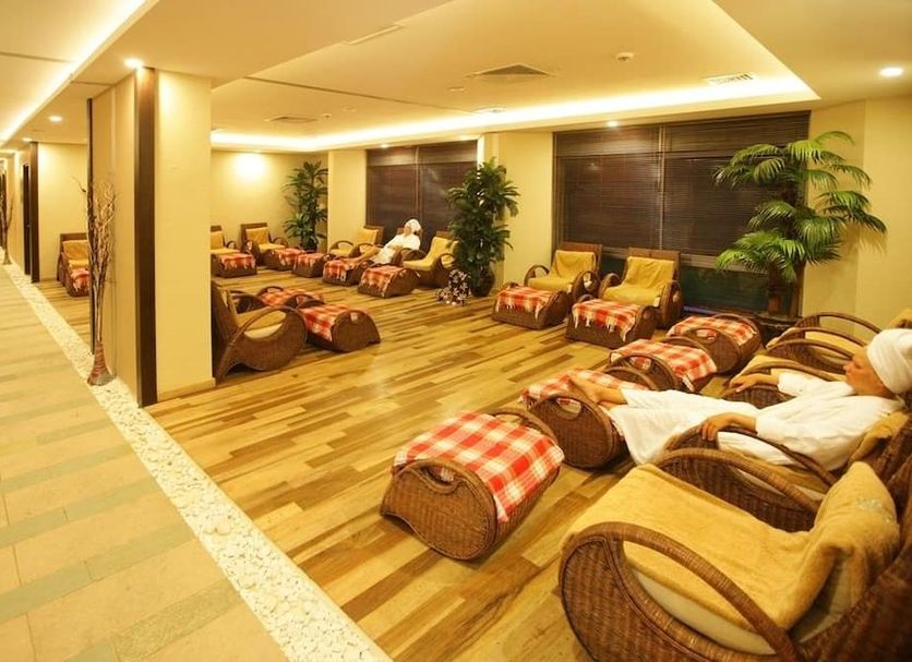 Mukarnas Spa Resort in Alanya spa relaxation lounge with wicker chairs and floor cushions