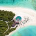 Aerial view of Hondaafushi Island Resort in Hanimaadhoo with infinity pool, white sand beach and turquoise water
